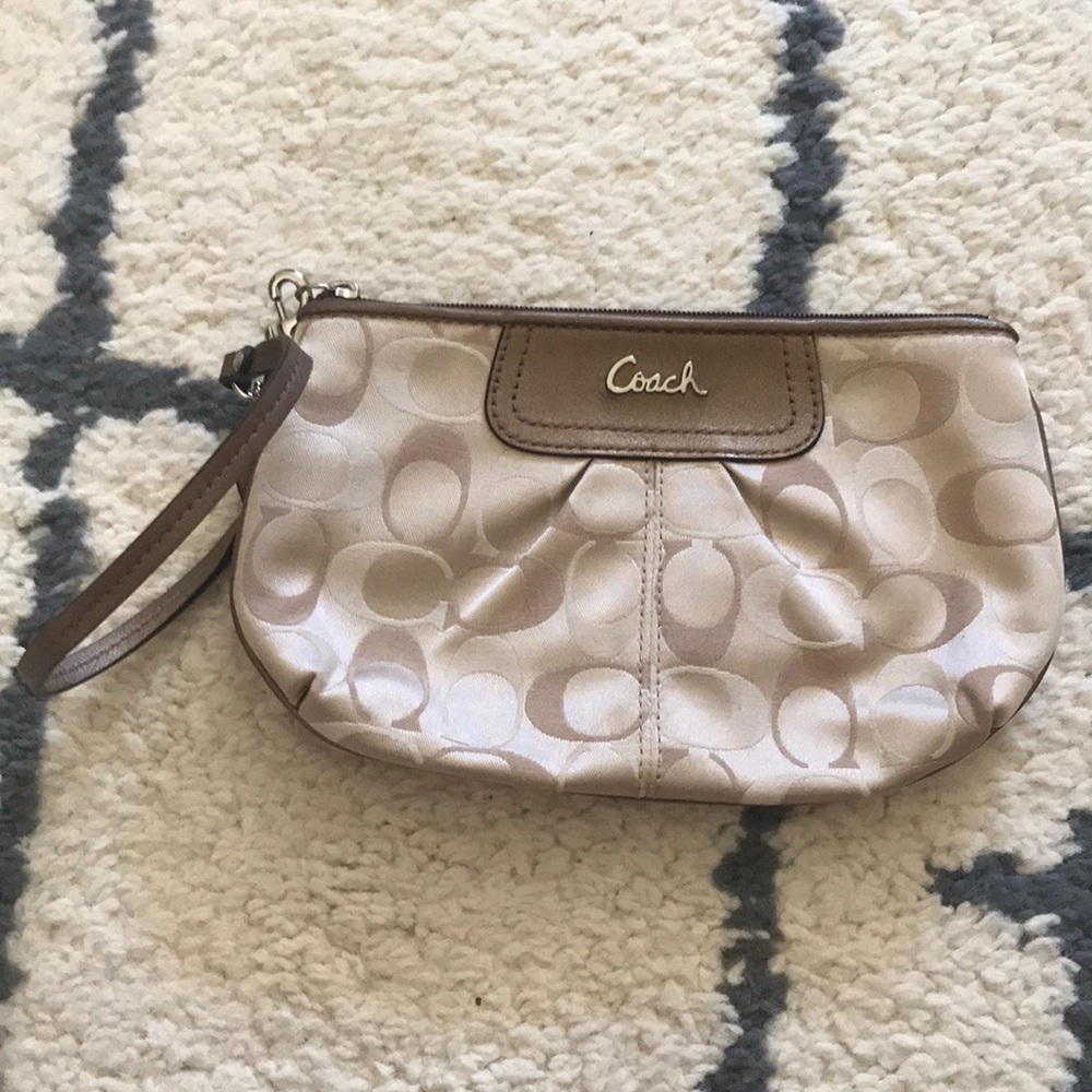 Tan Coach wristlet